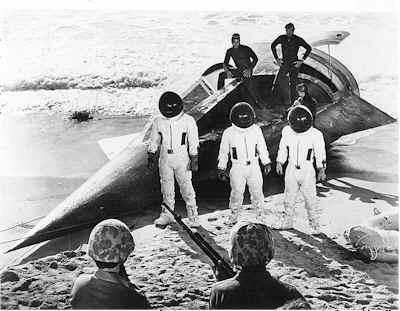 The crew of the Prometheus 1 exiting the capsule